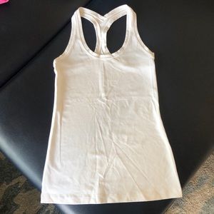 White Lululemon tank top.